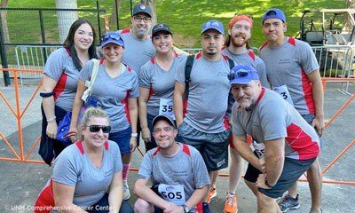 Group of Lobo Cancer Challenge participants in matching grey shirts