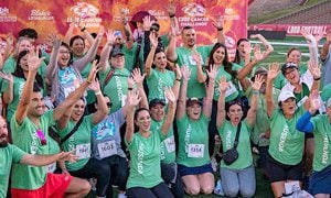Group of Lobo Cancer Challenge participants in matching green shirts